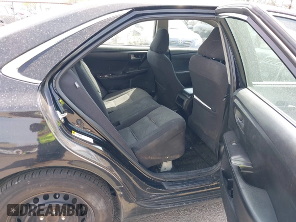 2015 Toyota Camry LE with VIN 4T1BD1FKXFU164963, listed as a IAAI auction lot 42132724 with 141,089 mi miles and . Bid and sale history available at DreamBid. Image 8.