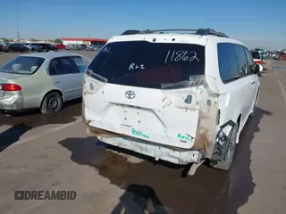 2014 Toyota Sienna SE with VIN 5TDXK3DCXES427950, listed as a IAAI auction lot 40394109 with 149,419 mi miles. Bid and sale history available at carsss.com. Image 6.