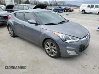 2017 Hyundai Veloster with VIN KMHTC6AD4HU310841, listed as a Copart auction lot 36048343 with 135,319 mi miles. Bid and sale history available at carsss.com. Image 4.