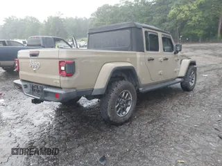 2020 Jeep Gladiator Overland z VIN 1C6HJTFG0LL160699, wystawiony jako IAAI lot #42326325 z przebiegiem 65 639 mil mil oraz . Historia ofert i sprzedaży dostępna na DreamBid. Obrazek 4.