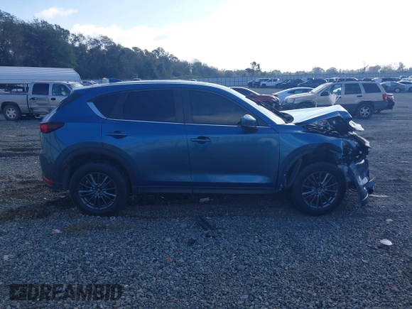 2020 Mazda CX-5 Touring with VIN JM3KFACM0L0775020, listed as a IAAI auction lot 40876970 with 96,424 mi miles. Bid and sale history available at carsss.com. Image 12.