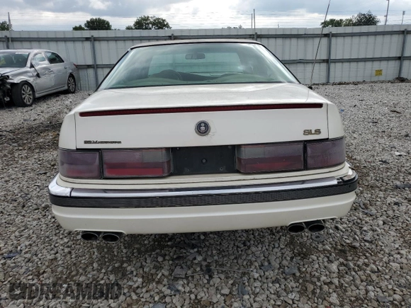 1995 Cadillac Seville Luxury SLS z VIN 1G6KS52Y7SU838169, wystawiony jako Copart lot #67941934 z przebiegiem 144 953 mil mil oraz Szkoda całkowita • Salvage title. Historia ofert i sprzedaży dostępna na DreamBid. Obrazek 6.
