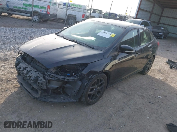 2016 Ford Focus SE z VIN 1FADP3FEXGL310270, wystawiony jako IAAI lot #40956503 z przebiegiem 156 812 mil mil oraz . Historia ofert i sprzedaży dostępna na DreamBid. Obrazek 2.
