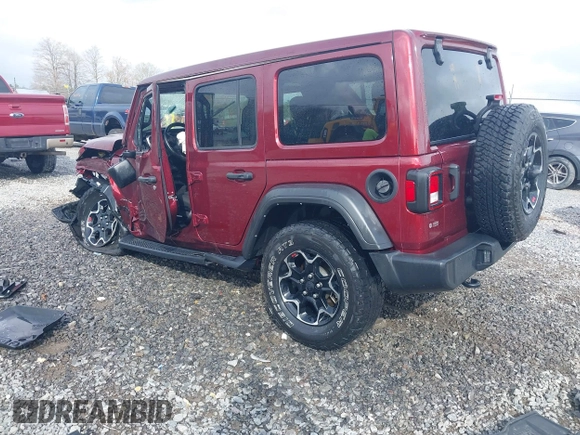 2021 Jeep Wrangler Unlimited Willys with VIN 1C4HJXDN8MW714976, listed as a IAAI auction lot 42080856 with 74,613 mi miles and . Bid and sale history available at DreamBid. Image 3.
