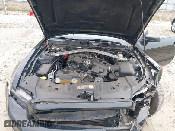 2014 Ford Mustang V6 with VIN 1ZVBP8EM4E5263548, listed as a IAAI auction lot 40331377 with 71,505 mi miles. Bid and sale history available at carsss.com. Image 10.