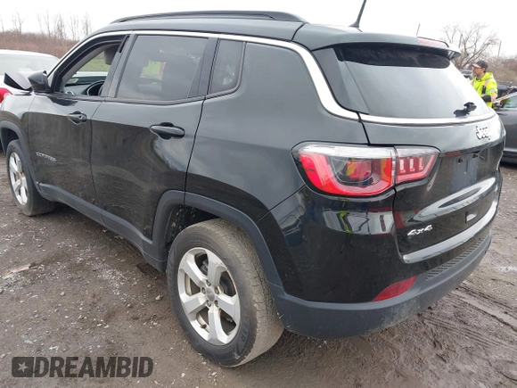 2018 Jeep Compass Altitude with VIN 3C4NJDBB2JT108035, listed as a IAAI auction lot 42013400 with 179,886 mi miles and . Bid and sale history available at carsss.com. Image 3.