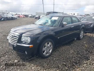 2006 Chrysler 300 C with VIN 2C3LK63H66H437280, listed as a IAAI auction lot 41615050 with 209,303 mi miles. Bid and sale history available at carsss.com. Image 2.