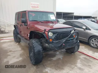 2007 Jeep Wrangler Unlimited Sahara with VIN 1J4GB59197L142223, listed as a IAAI auction lot 42025639 with 155,274 mi miles and . Bid and sale history available at DreamBid. Image 1.