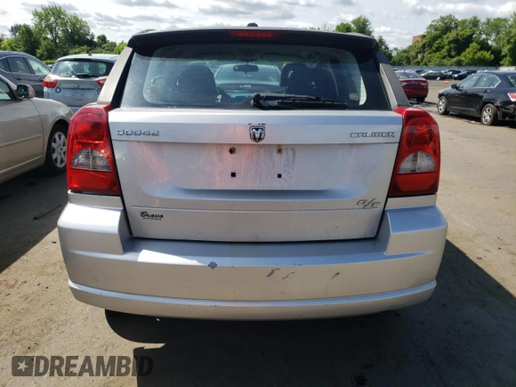 2009 Dodge Caliber R/T z VIN 1B3HB78B49D168677, wystawiony jako Copart lot #58051655 z przebiegiem 104 860 mil mil oraz Szkoda całkowita • Salvage title. Historia ofert i sprzedaży dostępna na DreamBid. Obrazek 6.