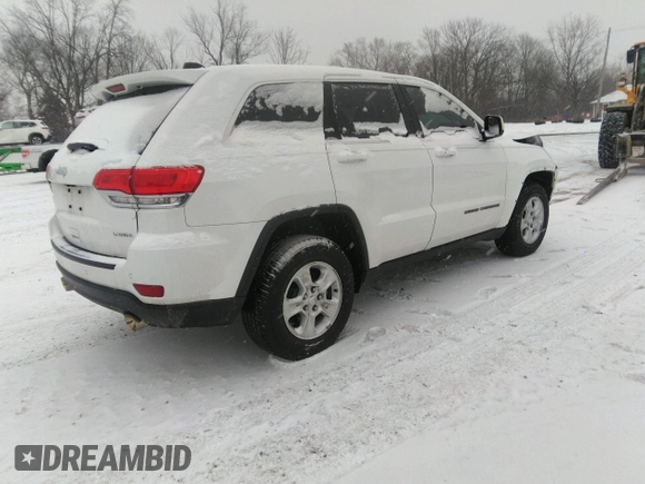 2017 Jeep Grand Cherokee Laredo with VIN 1C4RJEAG9HC854492, listed as a IAAI auction lot 41184619 with 134,839 mi miles. Bid and sale history available at carsss.com. Image 4.
