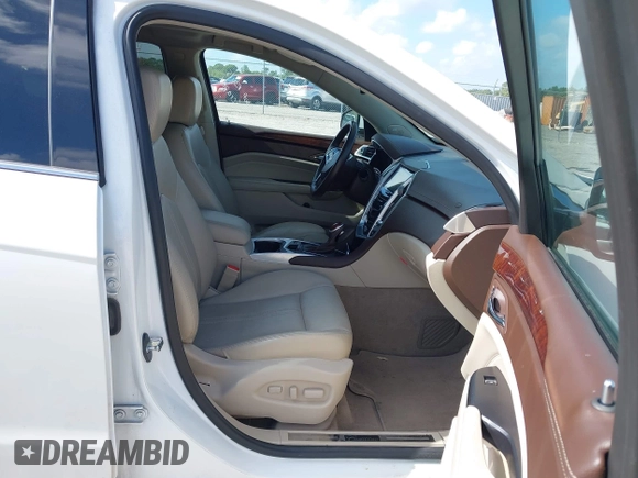 2016 Cadillac SRX Luxury Collection with VIN 3GYFNBE33GS551059, listed as a IAAI auction lot 39684221 with 78,321 mi miles and . Bid and sale history available at DreamBid. Image 5.