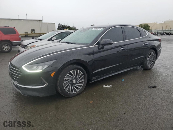 2021 Hyundai Sonata Hybrid SEL with VIN KMHL34JJ2MA019289, listed as a Copart auction lot 86589974 with 76,568 mi miles and Salvage Title. Bid and sale history available at carsss.com. Image 1.