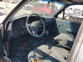 1990 Toyota Pickup DLX z VIN JT4VN13D3L5024456, wystawiony jako Copart lot #75834064 z przebiegiem 200 893 mil mil oraz Szkoda całkowita • Salvage title. Historia ofert i sprzedaży dostępna na DreamBid. Obrazek 8.
