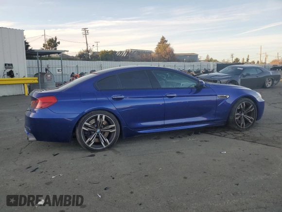 2014 BMW M6 z VIN WBS6C9C5XEDV73722, wystawiony jako Copart lot #87202664 z przebiegiem 68 283 mil mil oraz Szkoda całkowita • Salvage title. Historia ofert i sprzedaży dostępna na DreamBid. Obrazek 3.