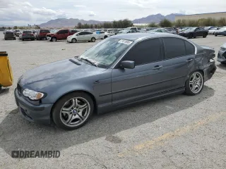 2003 BMW 3 Series 330i with VIN WBAEV53483KM03488, listed as a Copart auction lot 51610985 with 229,875 mi miles and Salvage Title. Bid and sale history available at carsss.com. Image 1.