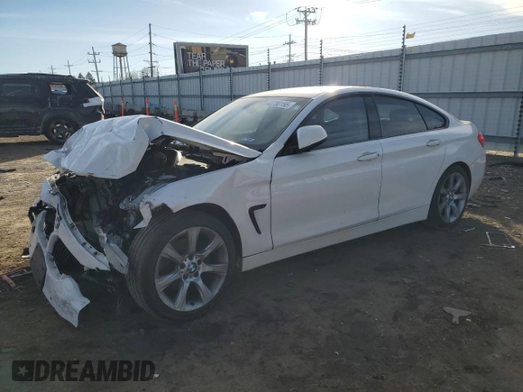2015 BMW 4 Series 428i with VIN WBA4A9C55FGL86731, listed as a Copart auction lot 42700155 with 110,897 mi miles and Salvage title. Bid and sale history available at DreamBid. Image 1.