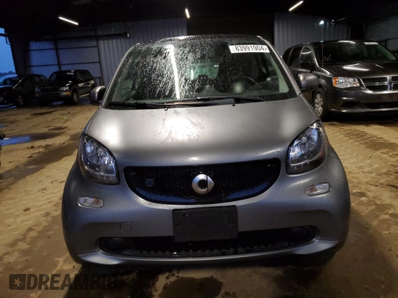 2019 Smart fortwo Pure z VIN WMEFJ9BA2KK396037, wystawiony jako Copart lot #83991904 z przebiegiem 32 137 mil mil oraz Szkody całkowita. Historia ofert i sprzedaży dostępna na DreamBid. Obrazek 5.