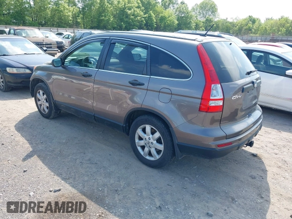 2011 Honda CR-V SE with VIN 5J6RE4H43BL089811, listed as a IAAI auction lot 42144060 with 212,559 mi miles and . Bid and sale history available at carsss.com. Image 3.