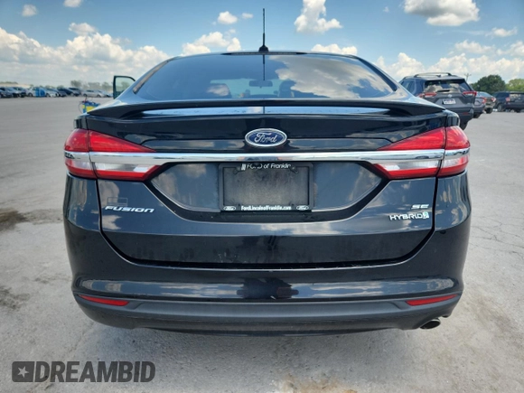 2017 Ford Fusion Hybrid SE with VIN 3FA6P0LU9HR356534, listed as a Copart auction lot 63660315 with 121,195 mi miles and Clean title. Bid and sale history available at DreamBid. Image 6.