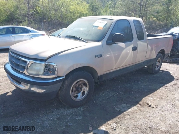 1998 Ford F-150 Standard with VIN 1FTZX1720WNB78292, listed as a IAAI auction lot 41881693 with 264,937 mi miles. Bid and sale history available at carsss.com. Image 2.