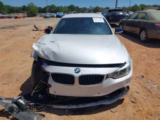 2014 BMW 4 Series 435i z VIN WBA3T3C5XEP737022, wystawiony jako IAAI lot #42135541 z przebiegiem 70 080 mil mil oraz . Historia ofert i sprzedaży dostępna na DreamBid. Obrazek 12.
