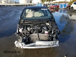 2022 Toyota Prius L Eco with VIN JTDKAMFU1N3179050, listed as a Copart auction lot 84764454 with 21,695 mi miles and Salvage Title. Bid and sale history available at DreamBid. Image 5.