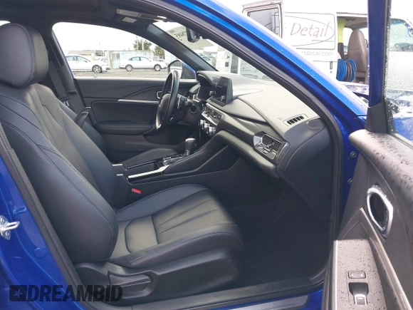 2023 Acura Integra w/A-Spec Package with VIN 19UDE4H31PA007411, listed as a IAAI auction lot 41778485 with 23,170 mi miles and . Bid and sale history available at DreamBid. Image 5.