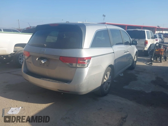 2014 Honda Odyssey EX-L with VIN 5FNRL5H64EB099175, listed as a IAAI auction lot 41522452 with 175,471 mi miles and . Bid and sale history available at carsss.com. Image 4.