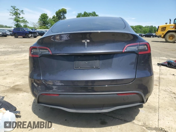 2024 Tesla Model Y with VIN 7SAYGDED6RF091715, listed as a Copart auction lot 56535585 with 23,120 mi miles and Salvage title. Bid and sale history available at DreamBid. Image 6.