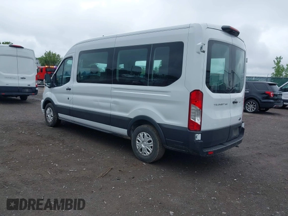 2022 Ford Transit Passenger XL with VIN 1FBAX2C86NKA79221, listed as a IAAI auction lot 42427641 with 56,245 mi miles and . Bid and sale history available at DreamBid. Image 3.