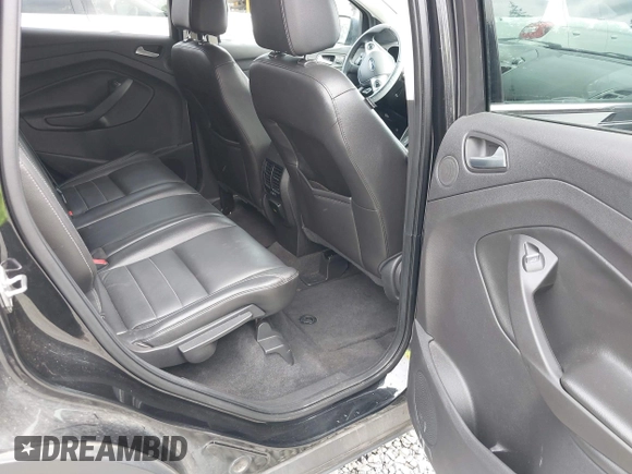 2014 Ford Escape Titanium with VIN 1FMCU9J95EUD60587, listed as a IAAI auction lot 42129854 with 155,559 mi miles and . Bid and sale history available at DreamBid. Image 8.