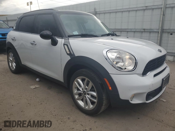2014 MINI Countryman S z VIN WMWZC3C57EWP51864, wystawiony jako Copart lot #71233944 z przebiegiem 73 828 mil mil oraz Szkoda całkowita • Salvage title. Historia ofert i sprzedaży dostępna na DreamBid. Obrazek 4.