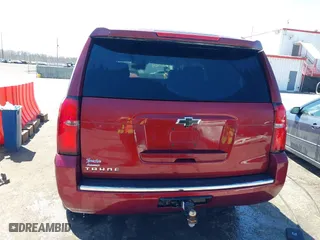 2016 Chevrolet Tahoe LTZ with VIN 1GNSKCKC9GR422695, listed as a IAAI auction lot 41880564 with 302,106 mi miles. Bid and sale history available at carsss.com. Image 16.