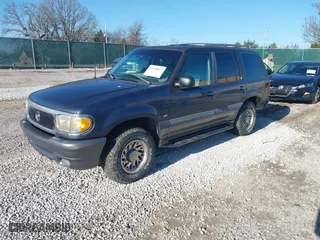 1998 Mercury Mountaineer with VIN 4M2ZU55P3WUJ17243, listed as a IAAI auction lot 41658097 with 219,464 mi miles. Bid and sale history available at carsss.com. Image 2.