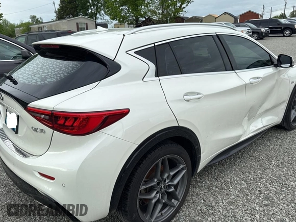 2018 Infiniti QX30 with VIN SJKCH5CP9JA044700, listed as a Copart auction lot 55697985 with Not provided miles and Clean title. Bid and sale history available at DreamBid. Image 4.