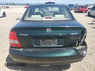 2002 Mazda Protege DX with VIN JM1BJ225121567924, listed as a Copart auction lot 54847545 with 93,653 mi miles and Salvage Title. Bid and sale history available at DreamBid. Image 6.