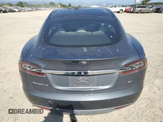 2014 Tesla Model S 60 с VIN 5YJSA1H15EFP49412, выставлен на аукционе Copart как лот 60476835 с пробегом 96 202 миль миль и Списание • Salvage title. История ставок и продаж доступна на DreamBid. Изображение 6.