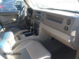 2007 Jeep Commander Sport z VIN 1J8HG48K07C559271, wystawiony jako IAAI lot #42032853 z przebiegiem 236 443 mil mil oraz . Historia ofert i sprzedaży dostępna na DreamBid. Obrazek 5.