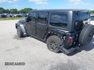 2024 Jeep Wrangler Sport S with VIN 1C4PJXDG7RW325735, listed as a IAAI auction lot 41309348 with 3,577 mi miles and . Bid and sale history available at DreamBid. Image 3.