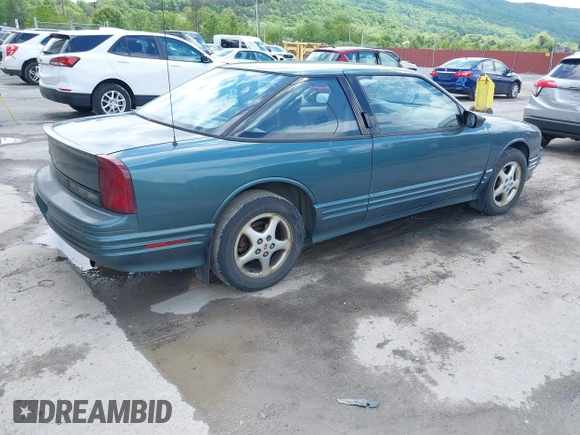 1997 Oldsmobile Cutlass Supreme S z VIN 1G3WH12M9VF317272, wystawiony jako IAAI lot #42346360 z przebiegiem 156 553 mil mil oraz . Historia ofert i sprzedaży dostępna na DreamBid. Obrazek 4.