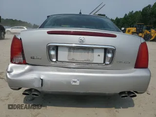 2005 Cadillac DeVille z VIN 1G6KD54Y85U187078, wystawiony jako Copart lot #58547715 z przebiegiem 95 905 mil mil oraz Szkoda całkowita • Salvage title. Historia ofert i sprzedaży dostępna na DreamBid. Obrazek 6.