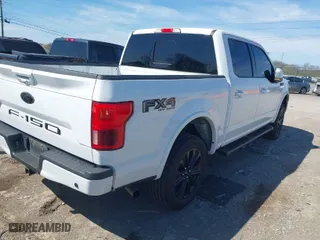 2020 Ford F-150 XL with VIN 1FTEW1E53LFB98833, listed as a IAAI auction lot 41875864 with 77,041 mi miles. Bid and sale history available at carsss.com. Image 4.