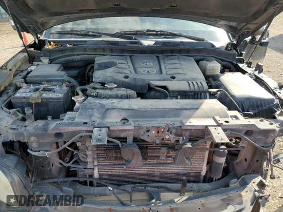 2012 Infiniti QX56 8-passenger with VIN JN8AZ2ND0C9715849, listed as a Copart auction lot 76386714 with 215,768 mi miles and Salvage Title. Bid and sale history available at carsss.com. Image 12.