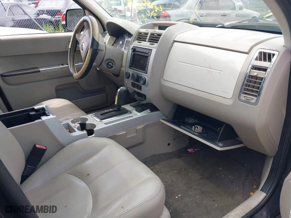2008 Mercury Mariner with VIN 4M2CU39H28KJ29475, listed as a IAAI auction lot 40083583 with 174,716 mi miles. Bid and sale history available at carsss.com. Image 5.