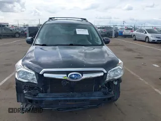 2014 Subaru Forester 2.5i Limited with VIN JF2SJAHC9EH448029, listed as a IAAI auction lot 41919935 with 153,728 mi miles. Bid and sale history available at carsss.com. Image 6.