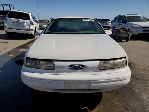 1994 Ford Taurus GL with VIN 1FALP52U7RG261559, listed as a Copart auction lot 55681304 with 28,675 mi miles and Salvage Title. Bid and sale history available at carsss.com. Image 5.