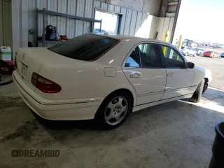 2002 Mercedes-Benz E-Class with VIN WDBJF70J82B449047, listed as a Copart auction lot 82839314 with 170,710 mi miles and Salvage Title. Bid and sale history available at carsss.com. Image 3.