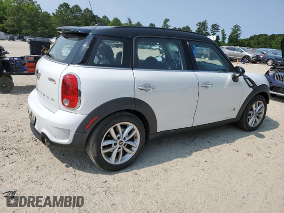 2014 MINI Countryman S with VIN WMWZC5C5XEWP37128, listed as a Copart auction lot 59549885 with 84,121 mi miles and Salvage title. Bid and sale history available at DreamBid. Image 3.