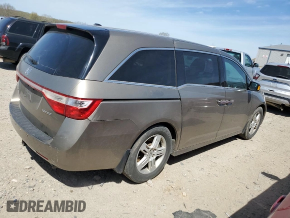 2011 Honda Odyssey Touring Elite with VIN 5FNRL5H9XBB030061, listed as a Copart auction lot 55067775 with 142,245 mi miles and Clean Title. Bid and sale history available at DreamBid. Image 3.