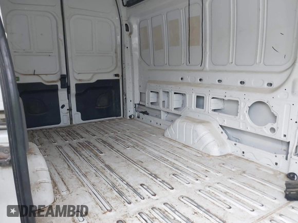 2023 Ford Transit Cargo с VIN 1FTBR3U89PKB38182, выставлен на аукционе IAAI как лот 42710478 с пробегом 78 774 миль миль и . История ставок и продаж доступна на DreamBid. Изображение 8.